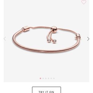 Pandora rose gold  bracelet w rose gold pave heart